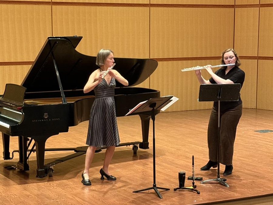 Performers on a recital stage at a UFA event